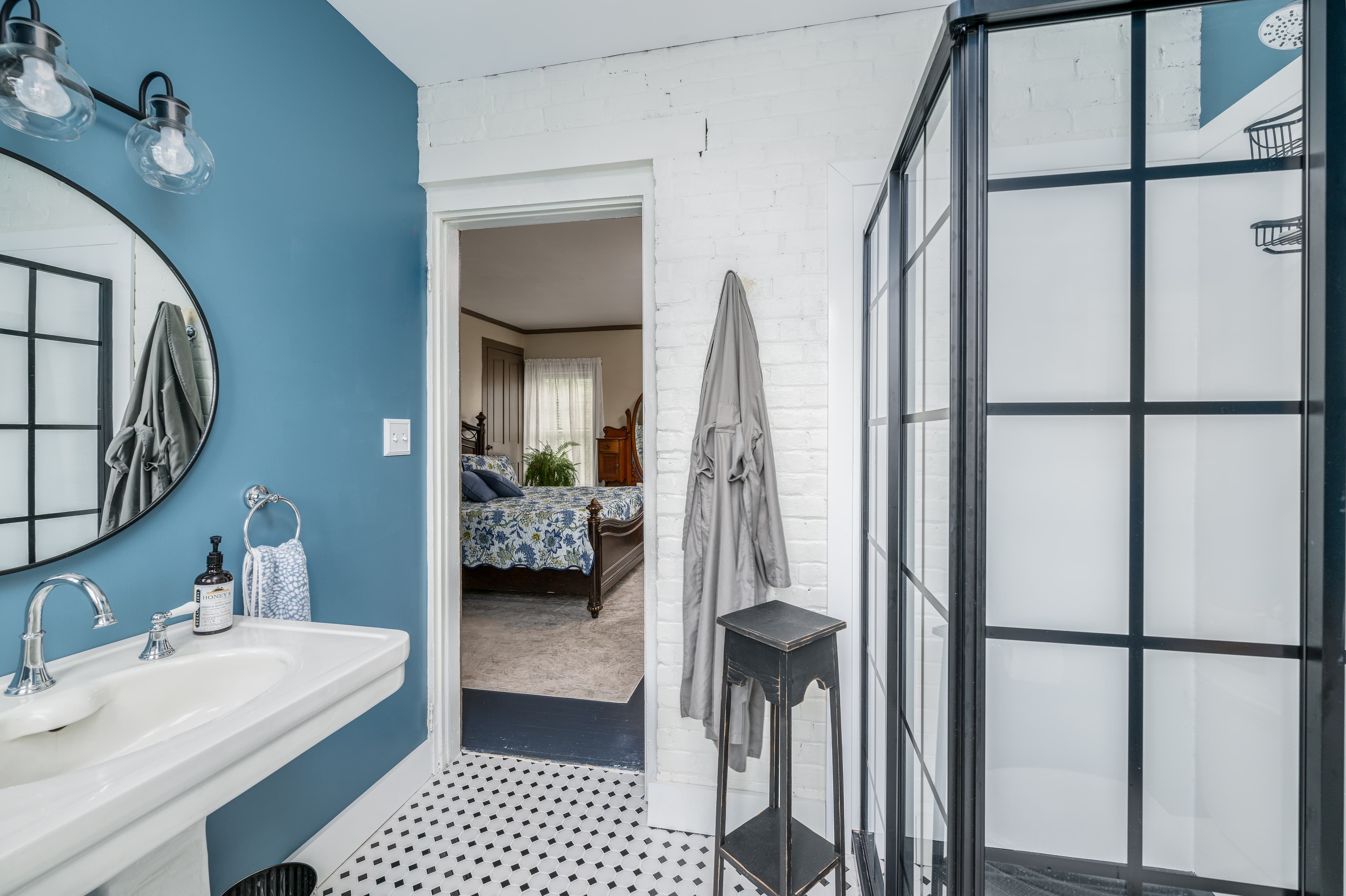 Modern blue bathroom with pedestal sink